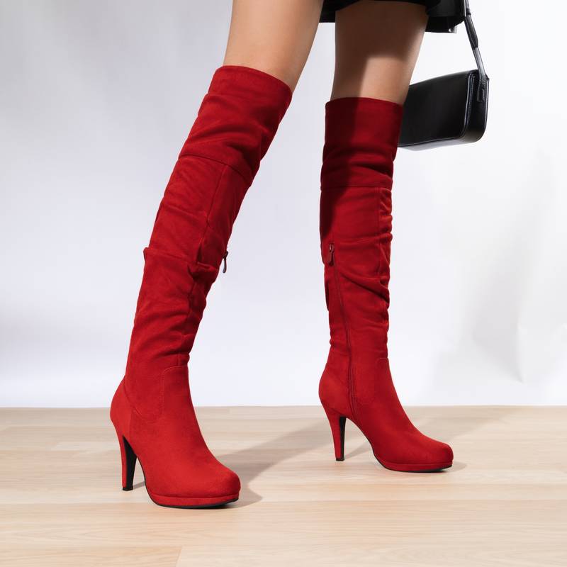 DREAM PAIRS women’s thigh-high platform boots.