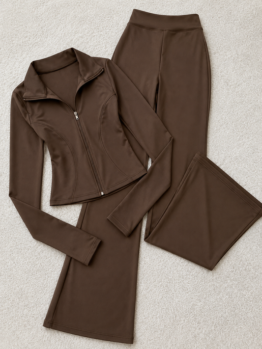 Women’s zip-up top and flared pants set.