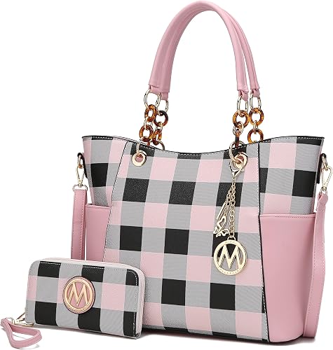 Women’s floral embossed tote bag with tassel charm.
