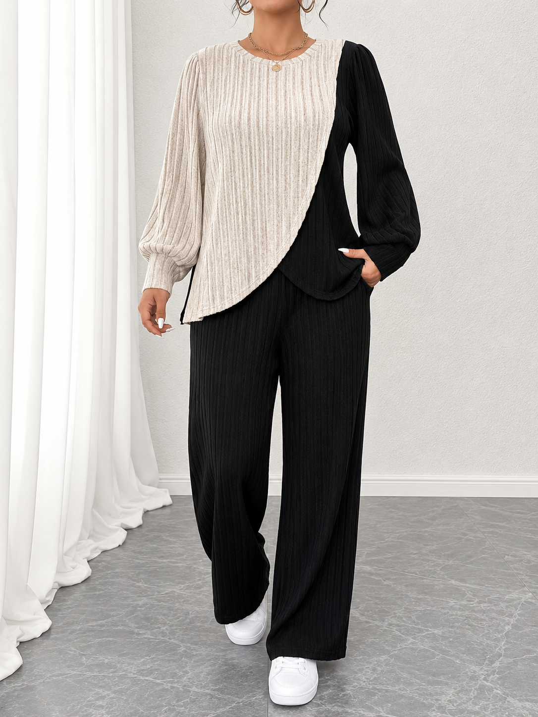 Women’s 2-piece color-block top and trousers set.