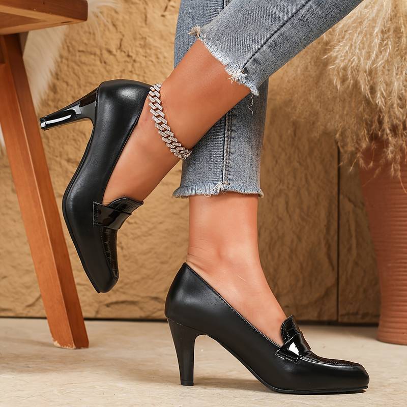 Women’s pointed toe high heel pumps.
