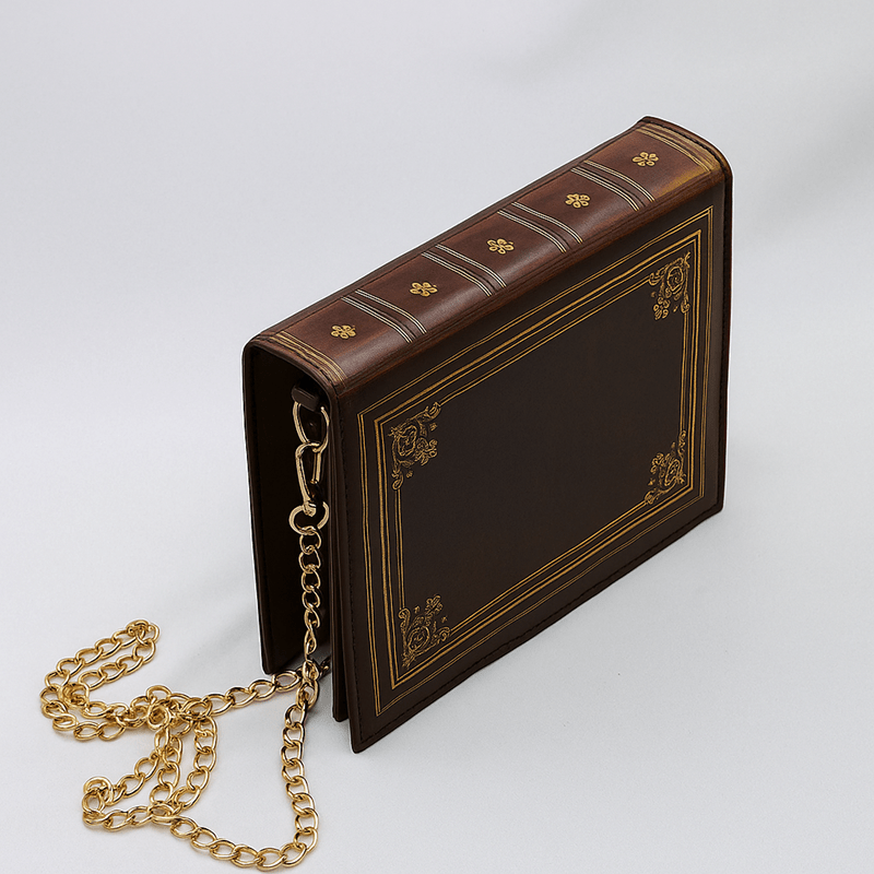 Brown book-style PVC crossbody handbag.