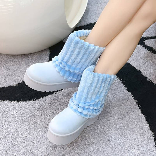 Women’s genuine suede leather snow boots.