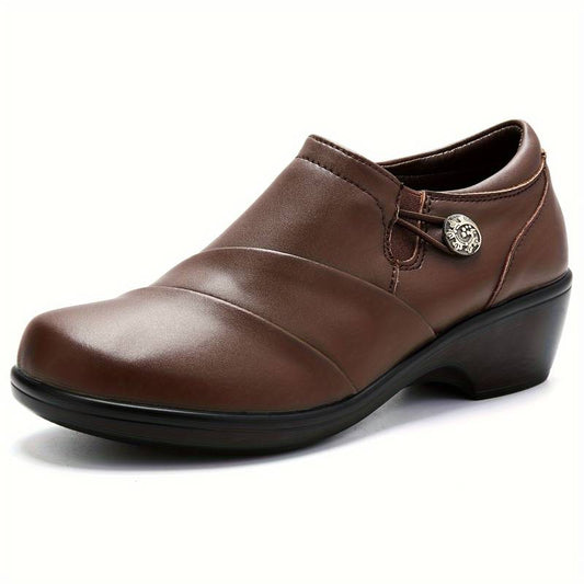Women’s chunky platform penny loafers.